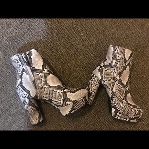 high heeled snake print booties